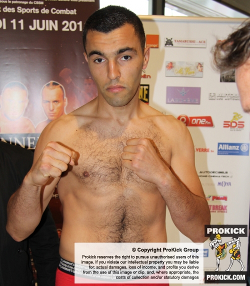 Samir Dourid tips the scales at the official Le Banner Vs Leko weigh-in