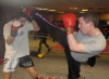 Prokick member Gareth Johnston lands a kick onto ProKick's European Title hopeful Karl McBlain at last night's sponsored 'spar-a-thon'