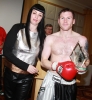 ProKick fighter Johnny Smith being presented the Award for Fighter Of The Year 2010/11 by Adele Robinson.