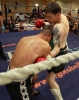 ProKick fighter Johnny Smith lands a  hard body shot on Jonathan Curmi of Malta.