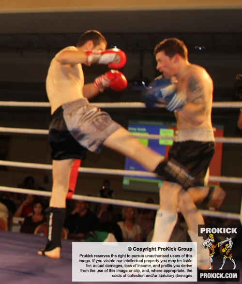ProKick fighter Johnny Smith takes a hard low kick from Daryl Orr