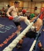ProKick fighter Johnny Smith lands a  hard roundhouse kick on Jonathan Curmi of Malta.
