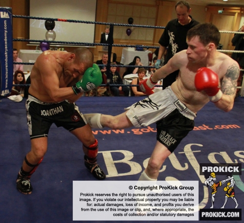ProKick fighter Johnny Smith lands a hard kick to the thigh of Jonathan Curmi of Malta.