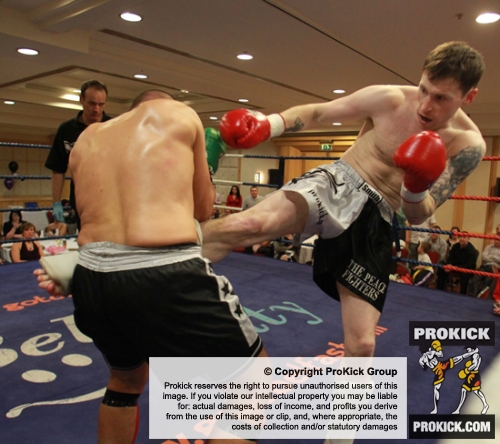 ProKick fighter Johnny Smith lands a  roundhouse kick on Jonathan Curmi of Malta.