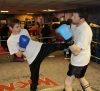 Prokick junior member Kallum O'Brien lands a kick onto ProKick's European Title hopeful Johnny Smith at last night's sponsored 'spar-a-thon'.