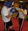 ProKick members Karen Millar and Russell Johnston sparring on the final evening of ProKick HQ's Level 2 Sparring Class.
