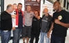 Jerome Le Banner and Stefan Leko pose with some of their team and event staff