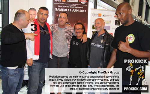 Jerome Le Banner and Stefan Leko pose with some of their team and event staff