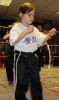 ProKick junior Beginner Lucy Foster working hard for her junior Yellow belt grading.