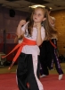 ProKick junior orange belt Morgan Buchanan working hard for her green belt grading.