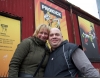 Nicolas and his wife standing outside ProKick HQ after their visit