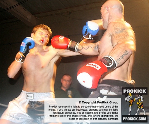 Peter Rusk looks for the big shot with a left hook towards Aidan Brooks