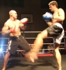 Peter Rusk taking the fight forward with a strong low kick