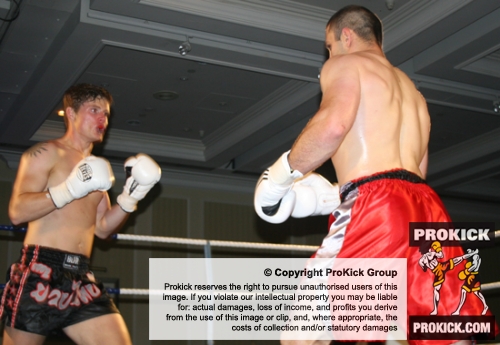 Peter Rusk takes the fight to opponent Rustam Guseinov