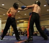 Simon Turkington In Action against Eoin Ryan (Li Ching Wu Dublin)