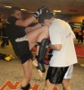 Prokick novice fighter Steven Forde lands a knee trike onto ProKick's European Title hopeful Karl McBlain at last night's sponsored 'spar-a-thon'.