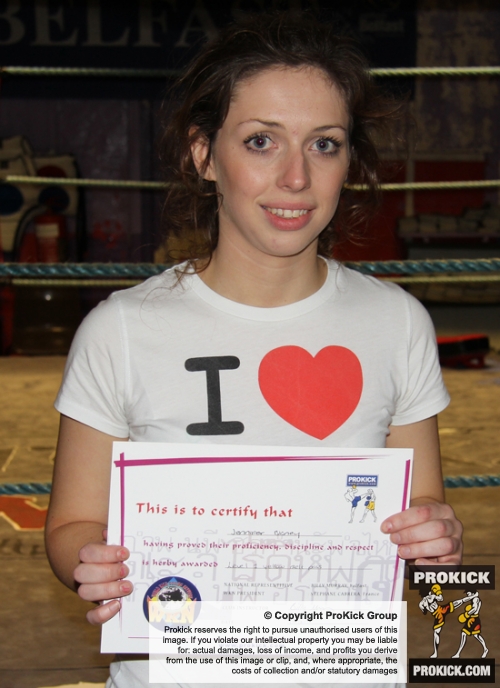 New ProKick Yellow Belt Jenny Blaney posing happily after a hard grading day at ProKick HQ