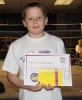 New ProKick Junior Yellow Belt Marshall Neill smiling with pride after a hard grading day at ProKick HQ