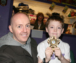 Young Alex McGreevy finally got his hands on his trophy (Pictured) with his Dad, Alex McGreevy Snr. ProKick's Adam also gives the thumbs up!