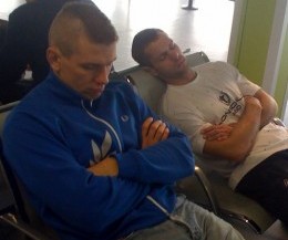 Pawel and Gary catch up on some sleep at the airport