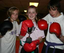 The two ProKick kids Supremes where given a draw and in their young but very mature wisdom decided to present the trophy to Aimee McKee. (Pictured center).