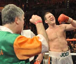 Martin Rogan after his remarkable upset with trainer John Breen looking on with pride