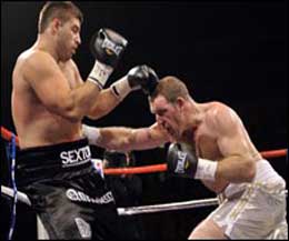 Sam Sexton (left) - it was the 25-year-old Norwich fighter's 13th win in 14 fights as he defeated Rogan for the second time.