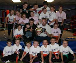 Big James Gillen with the future champions at the ProKick Gym, when he paid a visit, showing off his Malta Cup Belt.