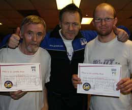 Billy Murray congratulates Desi and Colin on achieving their 3rd level brown belt.