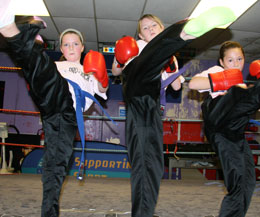 Big Belters - three of the prokick kids big grades - Laura and Chelsea-Leigh go to Purple with Troy (Centre) hitting brown