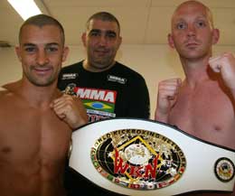 Stuart Jess (right) a Belfast based kick-boxer is hoping a fourth shot at a world title will reap reward - pictured with Champion Jose Oliviera.