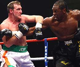 Prize fighter champion Martin Rogan (Right) claims victory over Audley Harrison and got a shot against Commonwealth and European champion Matt Skelton