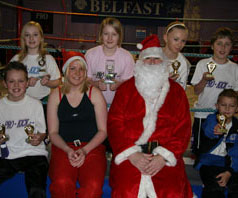 Santa Claus and his helper Jordan with the Prokick Says winners