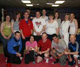 The East Belfast Princes Trust group at the Prokick Kickboxing gym in Wilgar Street after a day of fun and medal winners