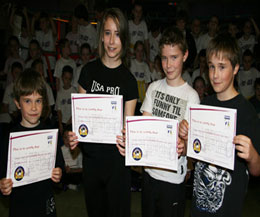 Family Eyre at the ProKick gym in Belfast - the quartet pictured here after their first grading back in Nov 2010