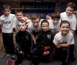 Kickboxing kids aim high as they move up the next level in the kickboxing ladder.