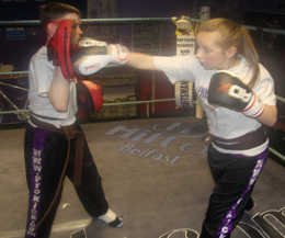 Saskia Connolly demonstrating her kowledge of punch combinations with her ProKick team mate.