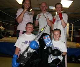 Winners Matthew McAlees and Saskia Connely show off their trophies alongside assistant instructor Lisa McAlees, title contenders Stuart Jess and Anne Gallagher