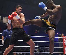 Badr Hari and Remy Bonjasky in previous fight action, are both on the card