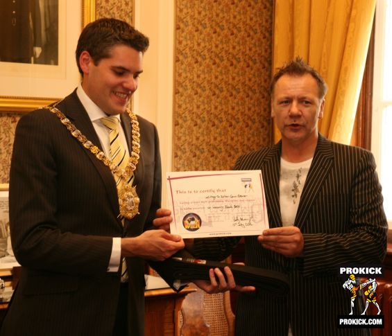 Black belt - the Rt Hon, Alderman Gavin Robinson is presented honouree black belt at the City Hall in Belfast by Billy Murray on behalf of Prokick and the WKN.