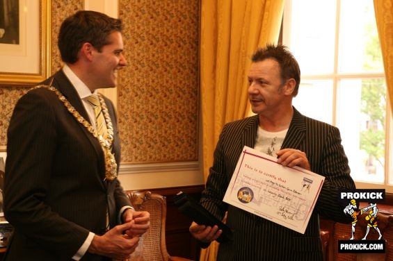 New honouree black belt - the Rt Hon, Alderman Gavin Robinson at Belfast's City Hall. Presented by Billy Murray on behalf of the ProKick and WKN group. 
