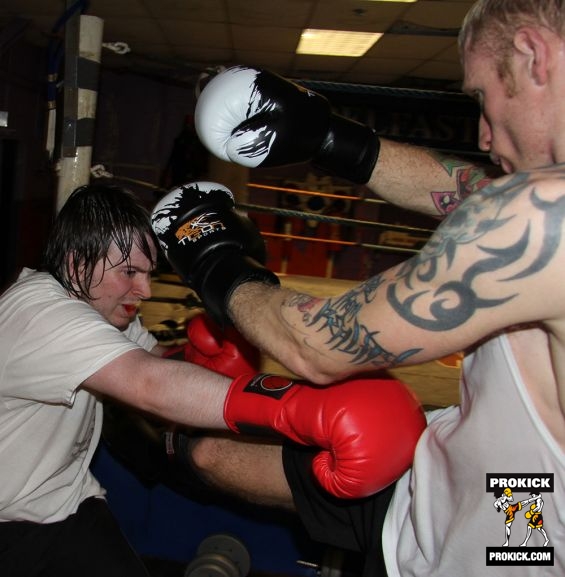 Darren McMullen throws a roundhouse to one of the new squad.-8