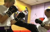 James kicking out to sparring partner Janice.-16