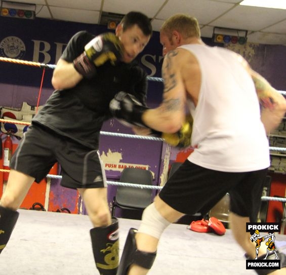 Johnny and Darren working the body in the ring.-24