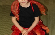 The little lady bird sitting peacefully at the fancy dress night.124