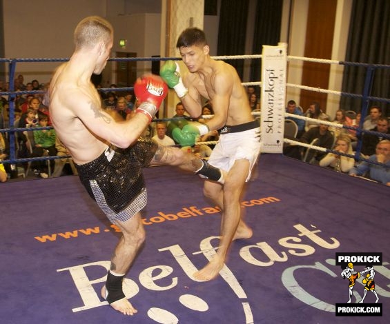 Mixing it up with an inside left low kick.-5