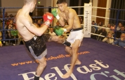 Mixing it up with an inside left low kick.-5