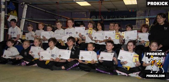 2-kids-group-belters - Group picture of kids getting to their next kickboxing level