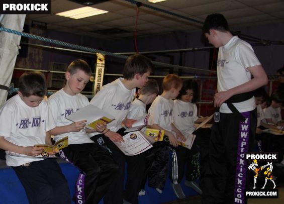 4-kids-group-belters - Black Belt Kyle Morrison keeping a watchful eye on the students