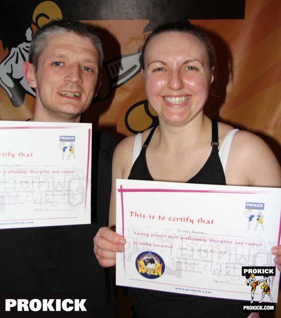 Tweedie-n-coates-orange-belts - Kickboxing Couple Amiee and Craig